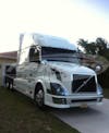Volvo VN Stainless Steel Fender Guards On White Truck